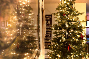 Christmas Tree reflected off of wall